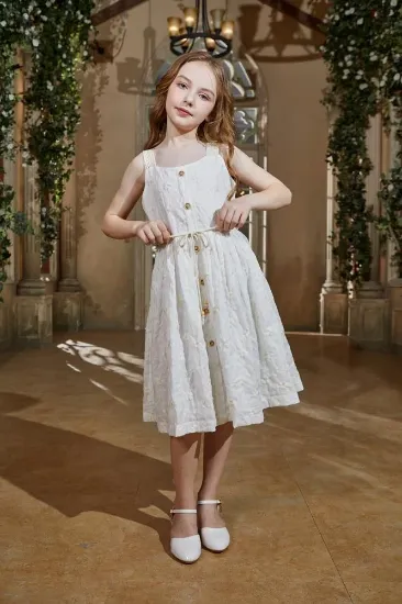 صورة فستان بناتي بيج علاقي مزين بازرة من الامام