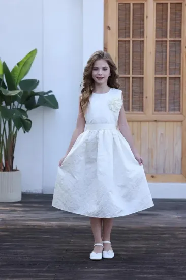 صورة فستان بناتي بيج كت وردة بالصدر