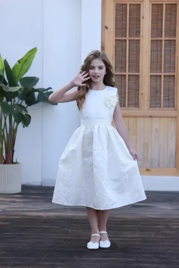 صورة فستان بناتي بيج كت وردة بالصدر