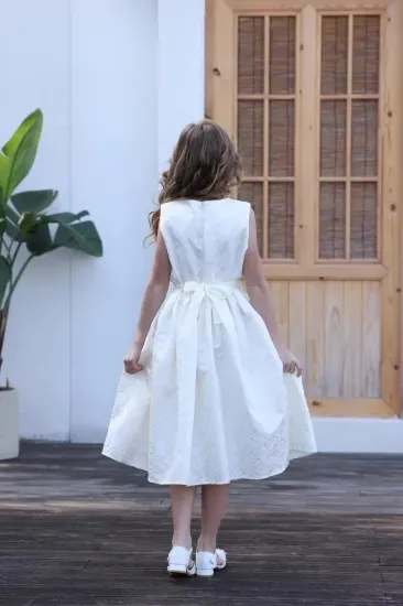 صورة فستان بناتي بيج كت وردة بالصدر