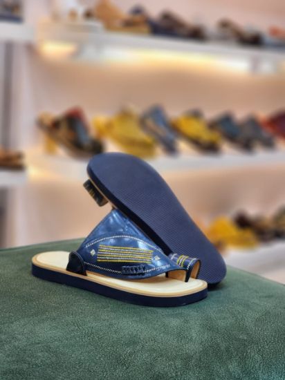 صورة زبيري وطني مطرز ارضيه جلد مديل و22