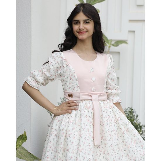 صورة فستان بناتي زهور وردي بفيونكة خصر حديثة وتصميم فريد | سحر التجدد - 1191