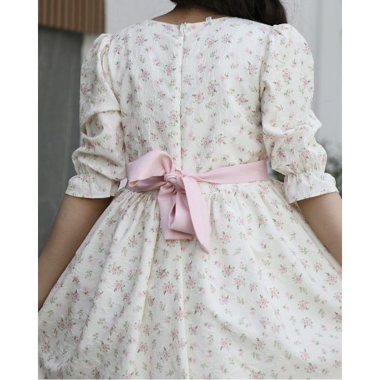 صورة فستان بناتي زهور وردي فاتح بفيونكة خصر حديثة وتصميم فريد | سحر التجدد - 1155