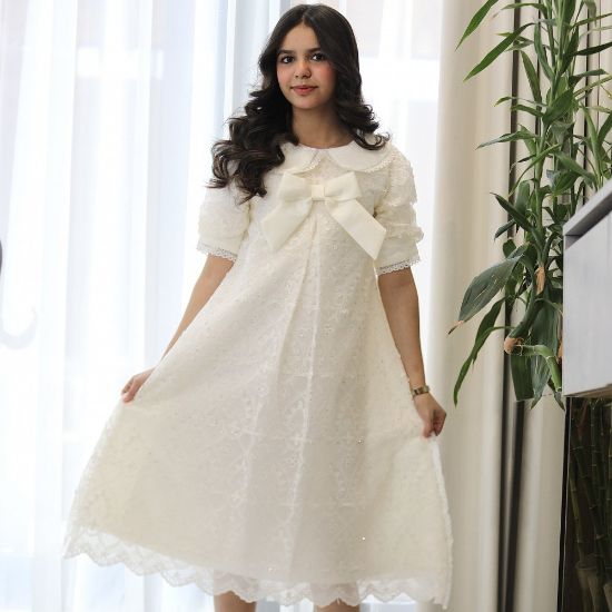 صورة فستان بناتي سكري بفيونكة صدر وكلفة جبير | تصميم كلوش كسرات - 1208