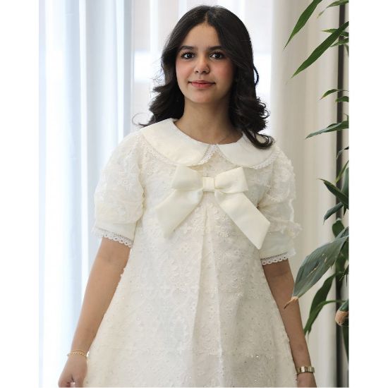 صورة فستان بناتي سكري بفيونكة صدر وكلفة جبير | تصميم كلوش كسرات - 1208