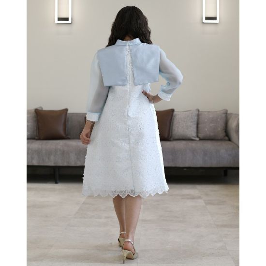 صورة فستان بناتي سماوي مطرز تشجيرة ودلعه بفيونكة رقبة وقصة نص كلوش - 1199