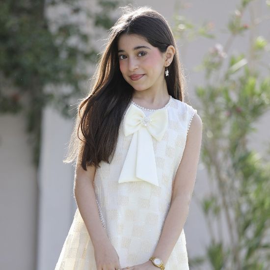 صورة فستان بناتي سكري كاروهات بفيونكة صدر وتحديد لؤلؤ ملكي - 1203