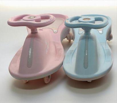 صورة مشاية اطفال دوارة هزازة مع لف التوجيه جملة