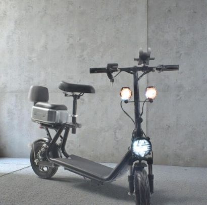 صورة سكوتر ابو سلة 3 كشافات حجم كبير