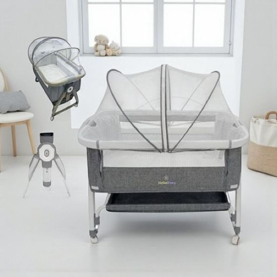 صورة سرير أطفال متنقل مع ناموسية وحامل هزاز
