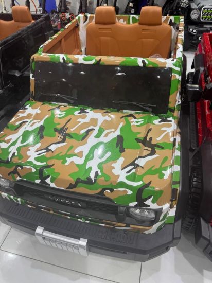 صورة سيارة أطفال كهربائية بتصميم عسكري