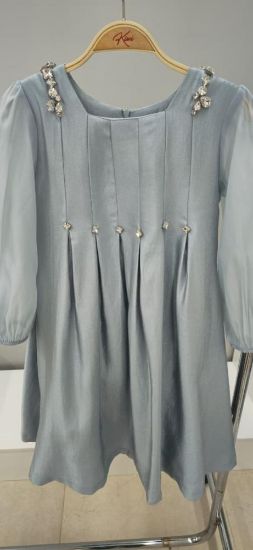 صورة فستان سماوي كم طويل ترتر